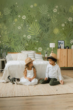 Sala de estar acolhedora com mural de parede botânico em verde suave